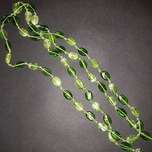 Green glass and string necklace.
